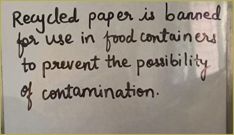 Why is recycled paper banned for use in food containers?
